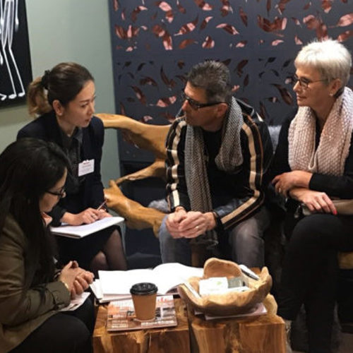 Homeshow image of four people sitting together