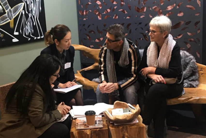 Homeshow image of four people sitting together