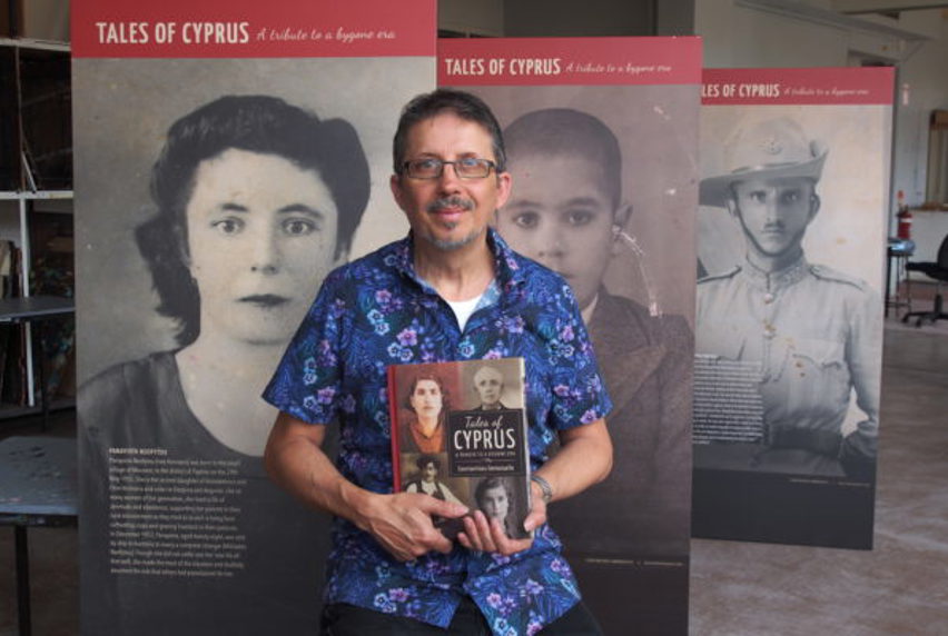 Con Emmanuelle standing with his book